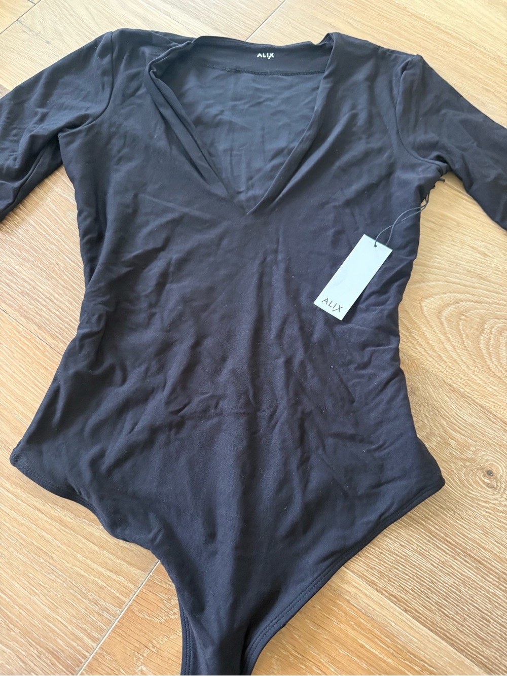 ALIX NYC Black V-Neck Long Sleeve Bodysuit